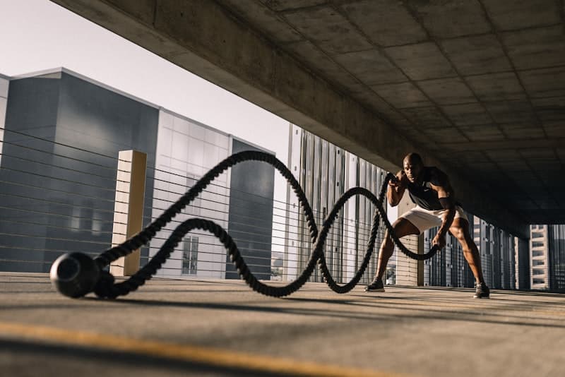 High-intensity interval training with kettlebell swings and burpees — HIIT cardio in action