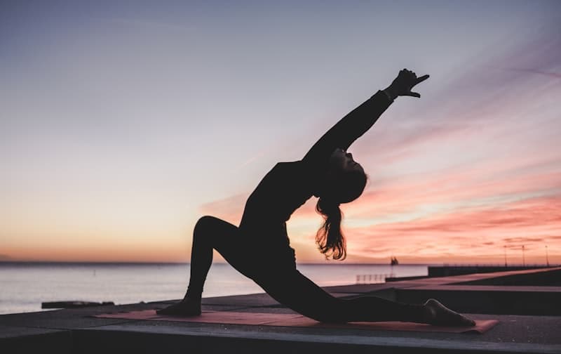 Person stretching showing joint mobility and flexibility