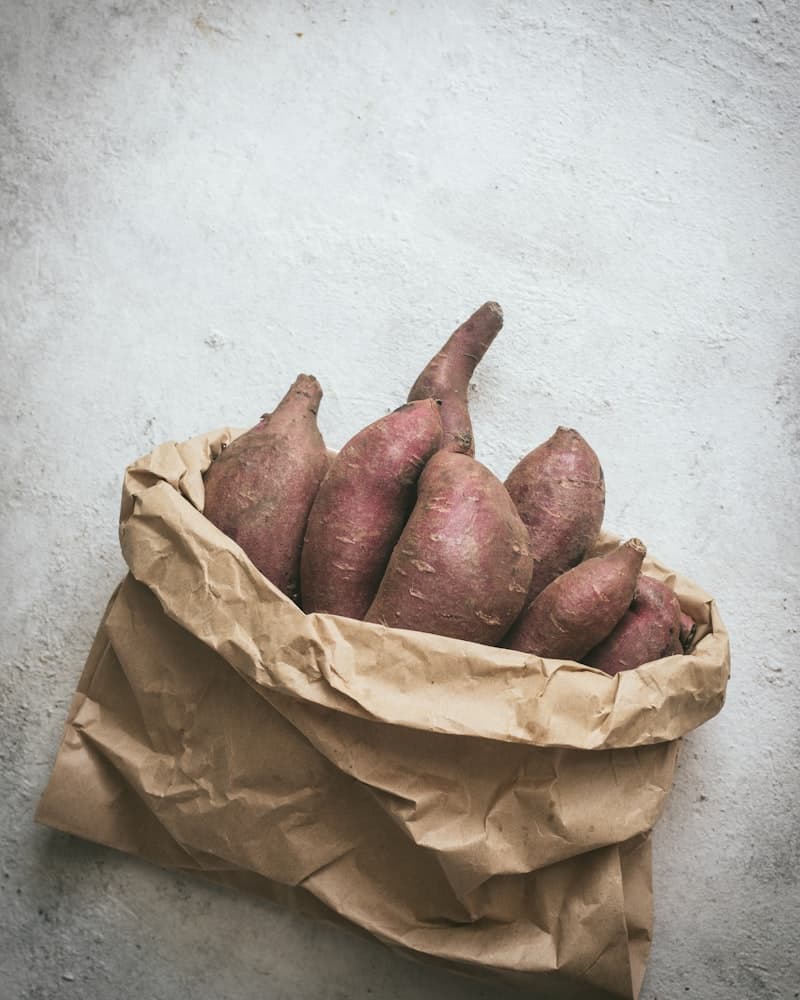 Decision flowchart — choosing sweet potato or white potato based on diabetes, weight loss, cooking method, and nutrition goals