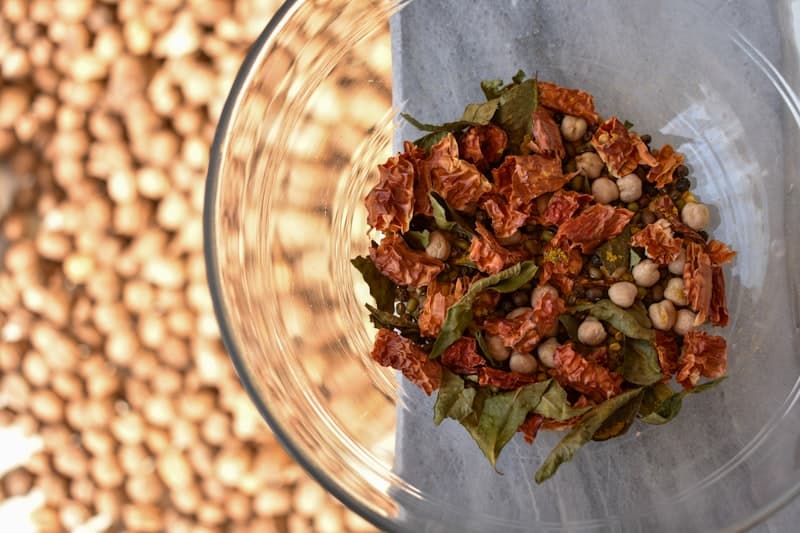 Fresh leafy greens and vegetables in a glass bowl — plant-based protein ingredients