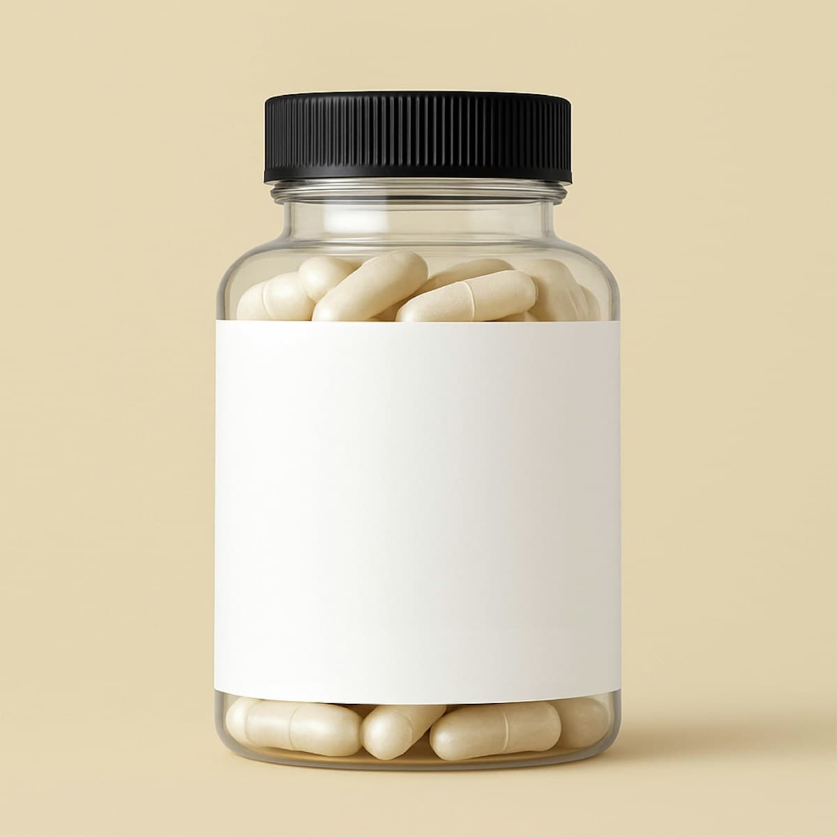 A clear supplement bottle filled with white capsules on a neutral beige background