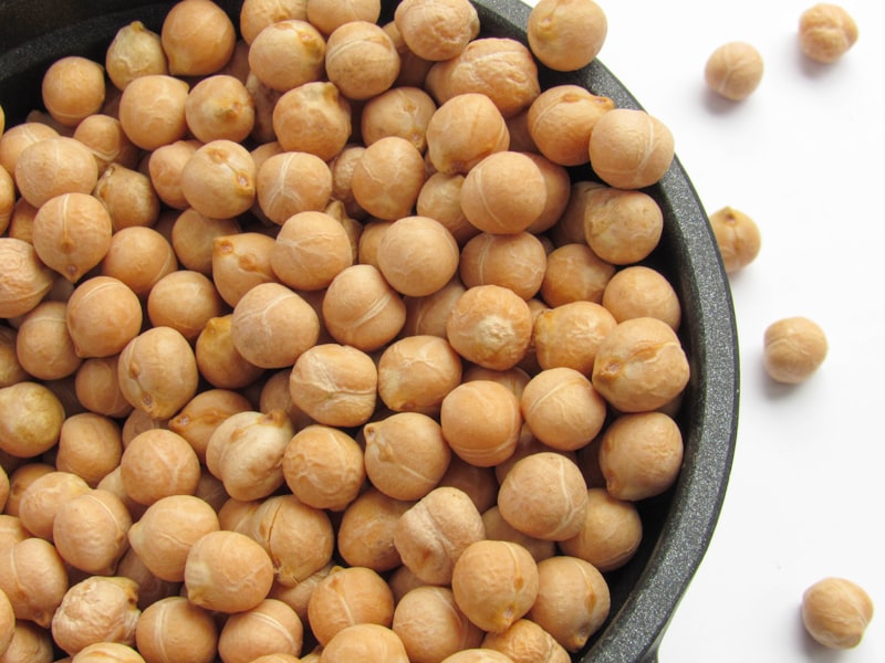 Chickpeas in a dark bowl — a nutritious plant-based protein source rich in essential amino acids