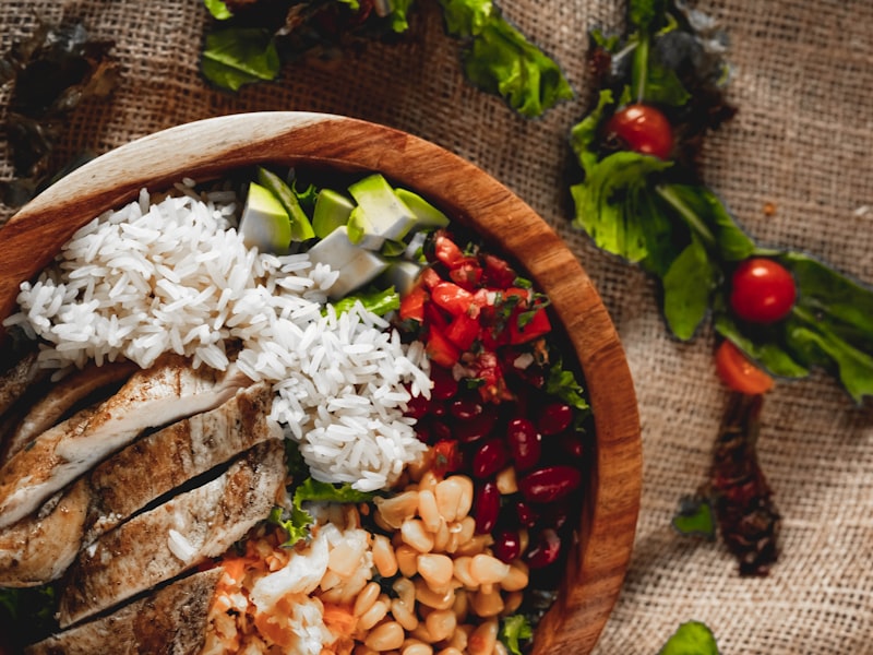 Post-workout meal with grilled chicken, rice, and vegetables -- nutrition for lifters